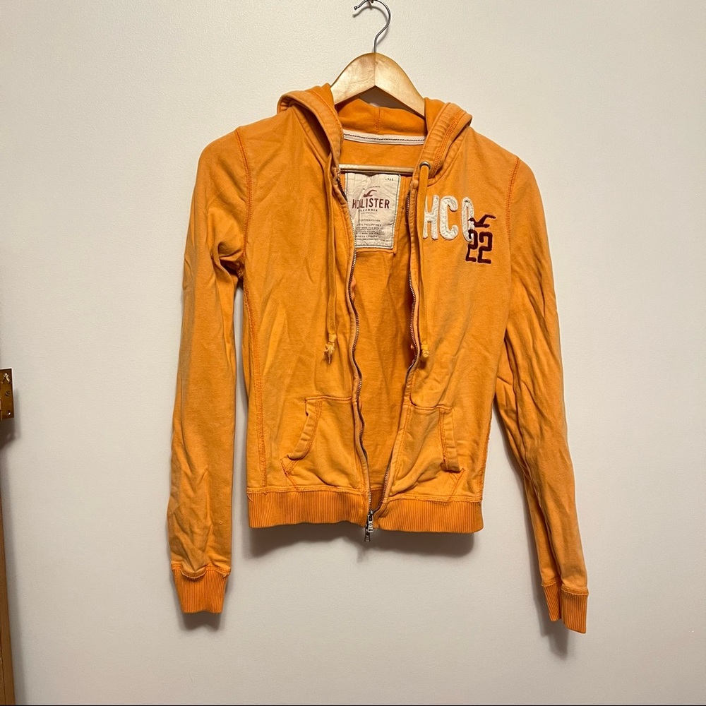 Ladies orange Hollister zip up hoodie size large